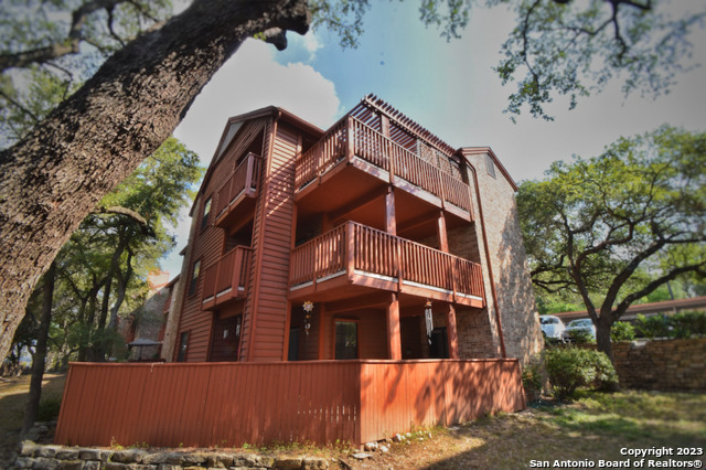 Perched atop mature oak trees, this large 2 bed 2 bath condo in Country Hollow becomes your hidden hide-away, with direct access to all your needs. HEB and a multitude of shopping options are moments away. Airport and downtown are less than a 15 minute drive down 281. One of the largest floorplans in the community, you'll have your own private wrap-around patio. There's a community pool and picnic/bbq area. Silestone quartz countertops, lots of cabinet space, and a new HVAC in July of 2023. Primary bath has a walk-in shower. This top floor unit only uses 1.5 flights of stairs due to terrain layout.Tenant is month-to-month, but would be thrilled to remain under a long term lease if investors are interested.