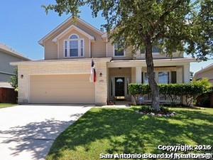 This Fabulous Texas style home includes multiple amenities, such as Custom Paint Colors, Wood Floors, Wooden Shutters, Stainless Steel Appliances, Granite Counter tops, Fireplace and Remodeled Master Bath and Master Closet.  With several living spaces upstairs and down there is plenty of room for everyone.  Outside you will find a 3-tiered Deck, Sprinkler System, Solar Screens, Storage Shed, Garage Door Opener, H2O Softener, Leaf Guard Gutters and Nice Landscaping.  Located in Gated Community. Don't miss this one!