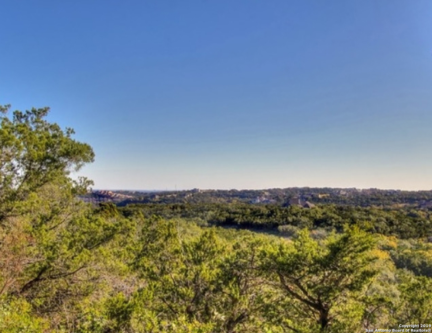 Awesome Views! Prefect location to build your dream home! Gorgeous hilltop views of San Antonio, mature trees, wildlife and breathtaking sunrises and sunsets!  More than 200 ft of frontage along Cielo Vista Dr.  This beautiful property is located between IH 10 and Babcock, just a short drive to La Cantera, The Rim, UTSA, Valero Energy, Leon Springs, Scenic Loop.  Very Special Property for the Discrete Owner! Must See!