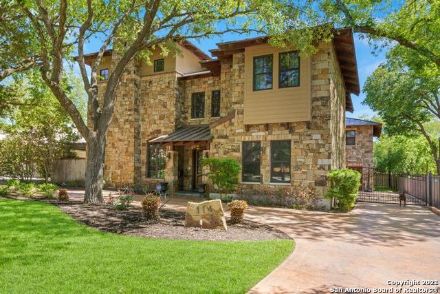 Great opportunity! Beautiful and spacious Colorado Stone home rich in design and function. Double door entryway opens to a foyer that leads to a large dining room on one side and a spacious living area with soaring beamed ceiling, inviting fireplace, and custom wood cabinetry on the other. Here you'll find a series of 8' doors that open up to an outdoor space perfect for entertaining. Chef's Island kitchen has 2 ovens, an abundance of storage and plenty of room for your family and guests to gather. Home theatre, wine vault, attached oversized 3-car garage in gated courtyard makes for plenty of secure parking and room for play. Low maintenance yard and outside bathroom. CPS Certified Smart Energy home. 75 gal. hot water heater less than 2 yrs. old. A/C's less than 4 yrs, old. These are just a few of the many things that make this home so special.
