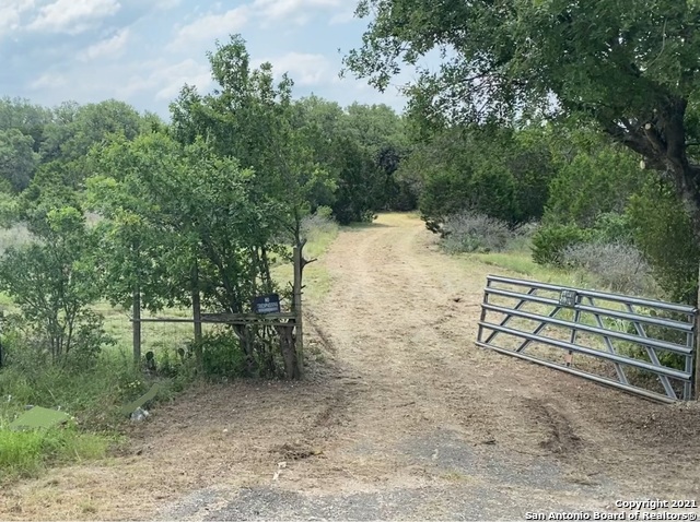 Great residential development opportunity! 10+ acres right off FM 3009 (close to FM 1863). Very rare to have land come up for sale on 3009 and this is it! The ideal site to build your home would be at the back of the land where a two-story home could potentially have great views. Electric is available and opportunity to install a private well. The land is fairly level with some slight rolling. There are quite a few trees including oak with some areas cleared by the previous owner to allow for development. Restrictions are limited to at least 1400 square foot home, no mobile or trailer homes. No restrictions for livestock. Located right across the street from Oak Valley Vineyard Restaurant.