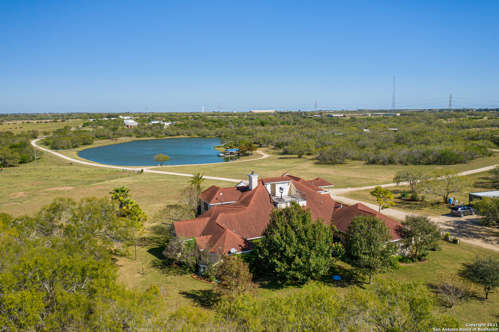 From the Starry Nights to the City Lights this one of a kind Texas Ranch is under 30 minutes to Downtown San Antonio & 1.5 hrs. to Austin! 45.36 Ag Exempt unrestricted acres with a 5 acre fully stocked pond that you can wakeboard on, wild game to hunt, and pasture for grazing!   4,400 Square Ft Custom home that you have to see to appreciate, 3 Walkout terraces to see the magnificent Texas night sky, Custom Solar Farm to go off grid, and 3 custom wells dug throughout the property this place is truly a resort style setup with top quality weight room, media room that you will not find anywhere for this price in the Central Texas corridor. Everything is bigger and better in Texas and it is clear to see why when you see this amazing Estate!