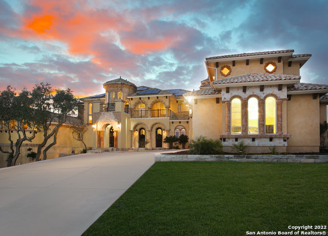 45 Champions Run!!! This Italian Renaissance inspired 8832sqft, 5Br, 6.5Ba, gated Mediterranean estate is located in the coveted, private & ultra-exclusive, community of "The Estates at Champions Run" located in the heart of Stone Oak. Exquisite ceiling detail, stunning hand painted murals as well as distressed wood, stone & marble are blended seamlessly to create a level of unparalleled luxury sure to impress the most discerning buyer. This exquisite & private gated estate features 2K sqft of covered patios (including 1 off of every bedroom), 20ftx8ft retractable exterior sliding glass doors, elevator, wine rm, work-out room, upstairs observatory/library, 8ft arched & stained doors, rounded butt glass windows in Breakfast Rm & family rm, Chef's kitchen w/commercial Wolf gas range, subzero fridge, coffee station, warming & microwave drawers, 115 solar panels, 2 outdoor fireplaces, etc. Enormous pool & jacuzzi w/slide, grotto, swim up table & bar stools.. WAY TOO MANY FEATURES TO LIST!!! The acute level of detail in this property is simply mind boggling. Call today for a private tour of this incredible estate.
