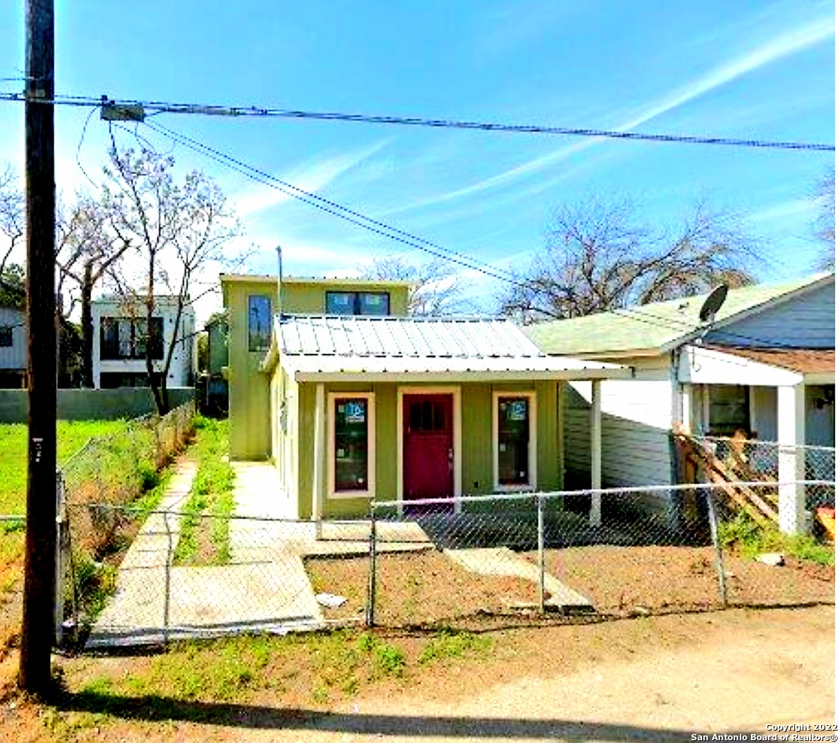 If your looking for prime property, look no further.  The property is located walking distance to downtown San Antonio and all that the city has to offer. This property is in mid finish. Some finish items include: Tin Roof 2015, washer and dryer hookup, windows, fully tape and float, The property has strong bones and waiting to be finished as desired. Currently the property is a One bedroom one bath and Zoned RM-4. This property  would make a great airbnb, investment property or a "get away" home  made to suite. Located minutes from the Airport, Alamodome, Riverwalk, Shops, Restaurants, The Pearl Brewery, Parks and so much more! This property can also be sold with the property behind at 321 Lavaca MLS 1587958