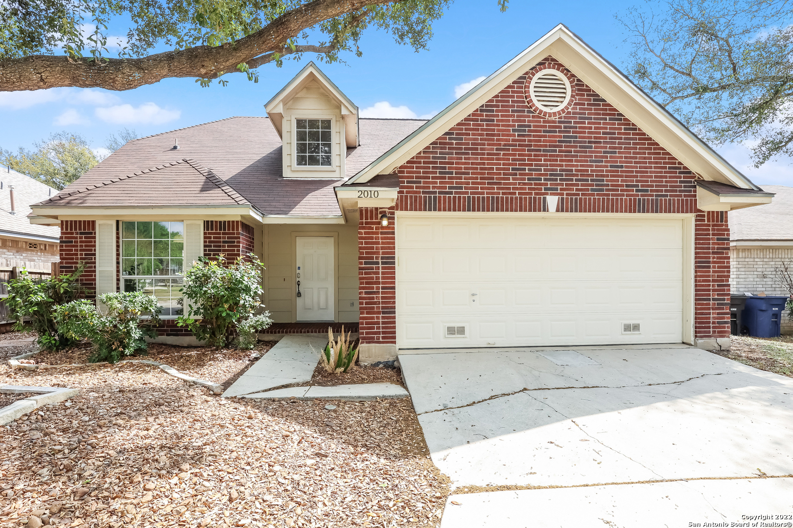This San Antonio two-story home offers a two-car garage.