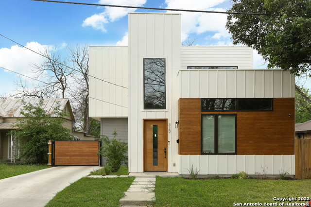 LOCATION, LOCATION, LOCATION! Just minutes away from the King William District, Riverwalk, Tower of the Americas, La Villita Historic Arts Village and much more! This Southtown modern home in the heart of the Lone Star Arts District offers 3 bedrooms, 2.5 baths and a detached 2 car garage. You will love this bright open floor plan this home has to offer! Upon entry you are welcomed by a spacious living area with a designer feel from the window placements to the wrought iron railing leading to the second level. The kitchen is gorgeous with plenty of storage, stainless steel appliances, a huge farm sink, quartz countertop with added seating provided by the breakfast bar. The Master Suite is located on the main level with a walk-in closet, full bath with wood look flooring throughout. *Master bath features a double vanity sink with storage. Pet owners will be delighted by the mud room as it features a dog wash, extra storage and washer/dryer hookup. Additional living space upstairs, open loft and secondary bedrooms with wood look flooring throughout. Enormous private backyard, perfect for entertaining and endless potential!