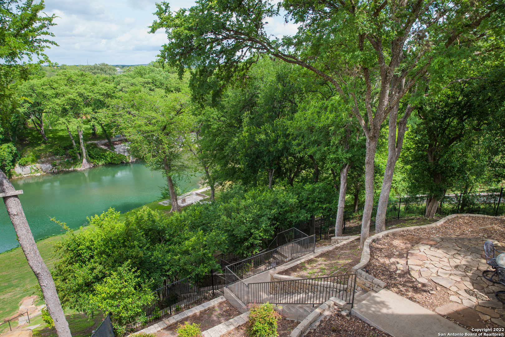 Rare opportunity to live in hill country heaven.  Gruene Reverie sits on over .4 acres of pristine waterfront just .7 miles from Gruene Hall.  After a day by the river, enjoy Gruene Village just steps from your front door.  Open and luxurious but warm and relaxing, this gem has it all.