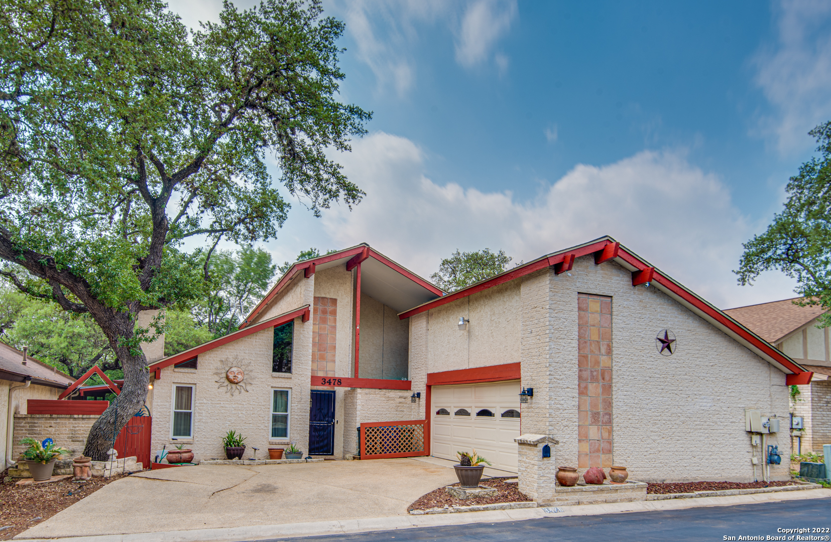 Open House July 1, 12-4pm.Excellent opportunity in the heart of San Antonio. Do not miss this one story Garden home in established neighborhood. This 2 bedroom garden home features a living room with bar, separate dining room, kitchen with breakfast area, backyard with covered patio and a 22 x 10 atrium with endless possibilities. Master bedroom has a 10 x 11 room with closet that can be used as an office, study, office, nursery etc... House backs up to park to the church behind it. Gated for quick access to park in the back. Roof replaced April 2016. Home is very low maintenance  (no grass to worry about) Quiet neighborhood with close proximity to 410, shopping, schools and restaurants. Low HOA fee! Refrigerator, washer and dryer convey depending on offer.