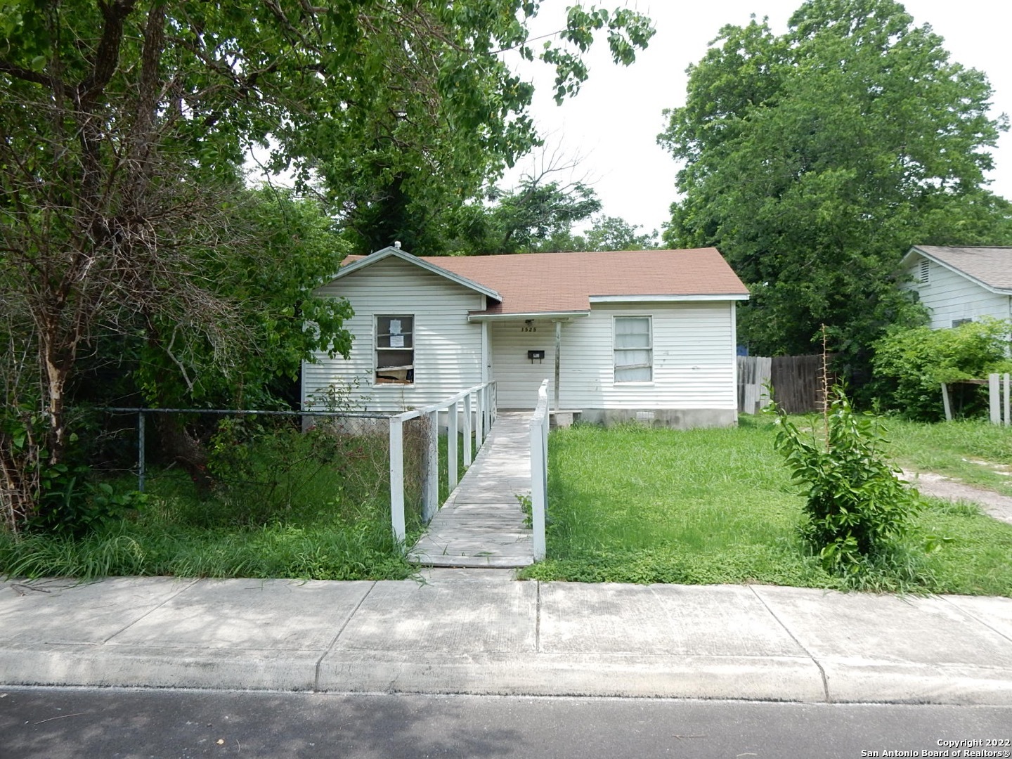 Excellent opportunity. Check out the size of these rooms. The bedroom was originally two bedrooms but the wall has been removed. There are two storage sheds. The large one has electricity and could be a shop or detached apartment. So many possibilities! The area is convenient to I-10, I-410, and the downtown business district. It is strongly encouraged that all offers contain proof of funds. Seller exempt from disclosure.