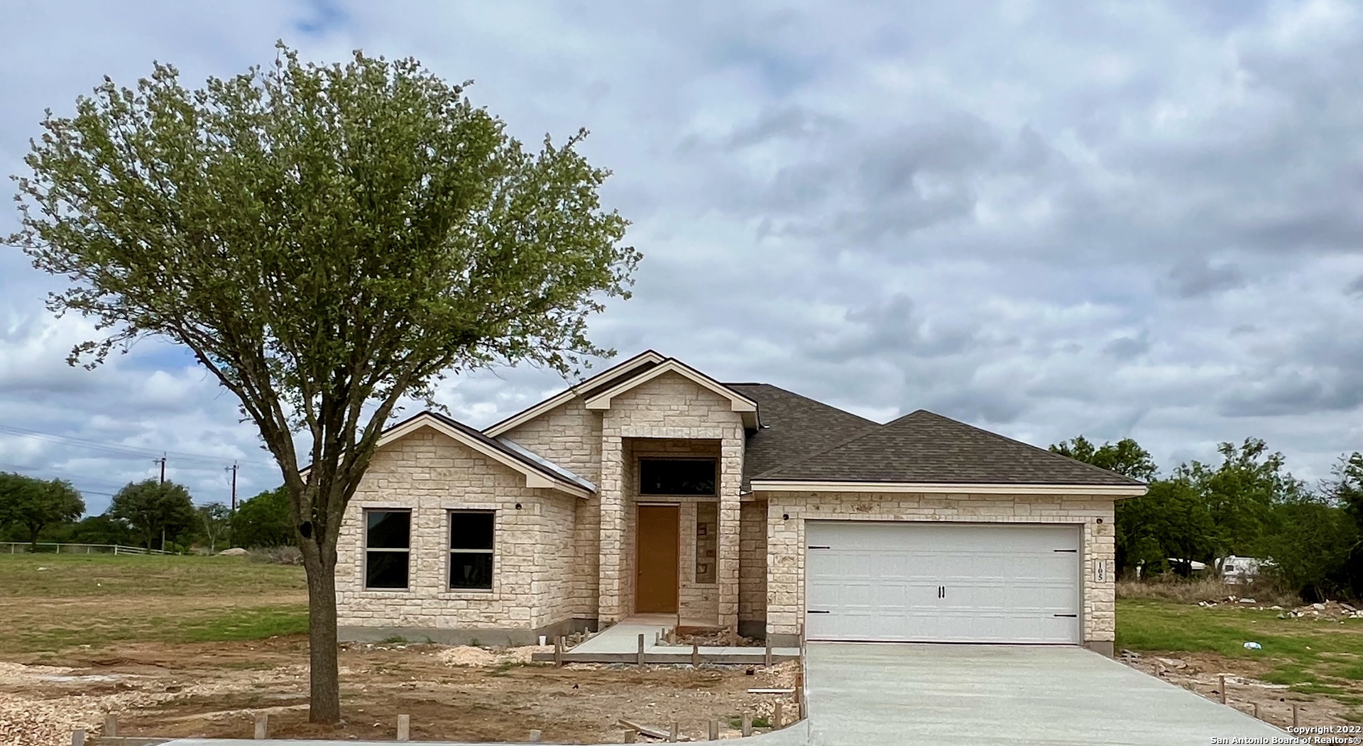 Beautiful New home in The Granberg on a .75 Ac.  This home has 3 Bedroom and 3 bathrooms with no steps and no carpet all tile. High ceilings and abundant light. Master suite with large walk-in closet and walk in shower. Nicely sized kitchen with solid countertops & stainless steel appliances.