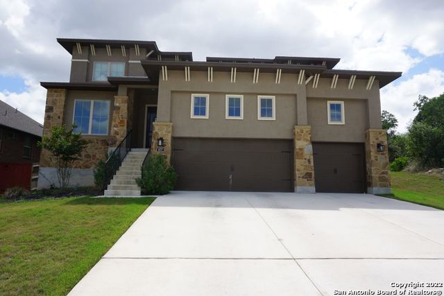 This is a stunning 2 story home with a 3-car garage on almost 1/3 of an acre at the end of a cul-de-sac. Great opportunity to move into an almost brand new home finished July 2020, but without the wait. This home features open floor plan with vaulted ceilings. Homeowners added over 80K of upgrades which include gourmet kitchen with stainless steel appliances, chef size hood, massive gorgeous island, additional cabinetry with butler pantry, large walk-in pantry, desk, custom granite throughout entire home, custom tile on floors and showers in all bathrooms, blown in insulation, custom wrought iron railing, sweeping staircase, LOW-E windows, and an oversized water softener with carbon filtration tank for filtered water throughout the house. A sunroom and beautiful covered patio were added to enjoy the backyard. The home has a spacious master bedroom on the main floor. The master bath has a huge enclosed walk-in shower with bench and dual waterfall shower heads, garden tub, double vanities and a huge walk-in closet. First floor includes office, formal living or dining room, kitchen, sunroom, family room, master bedroom and bath, powder room, and utility room. Second floor includes large game room, 4 bedrooms with walk-in closets, and 2 full baths. Pet free and smoke free home.