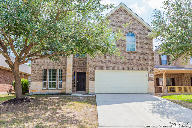 This San Antonio two-story home offers granite countertops, and a two-car garage.    This home has been virtually staged to illustrate its potential.