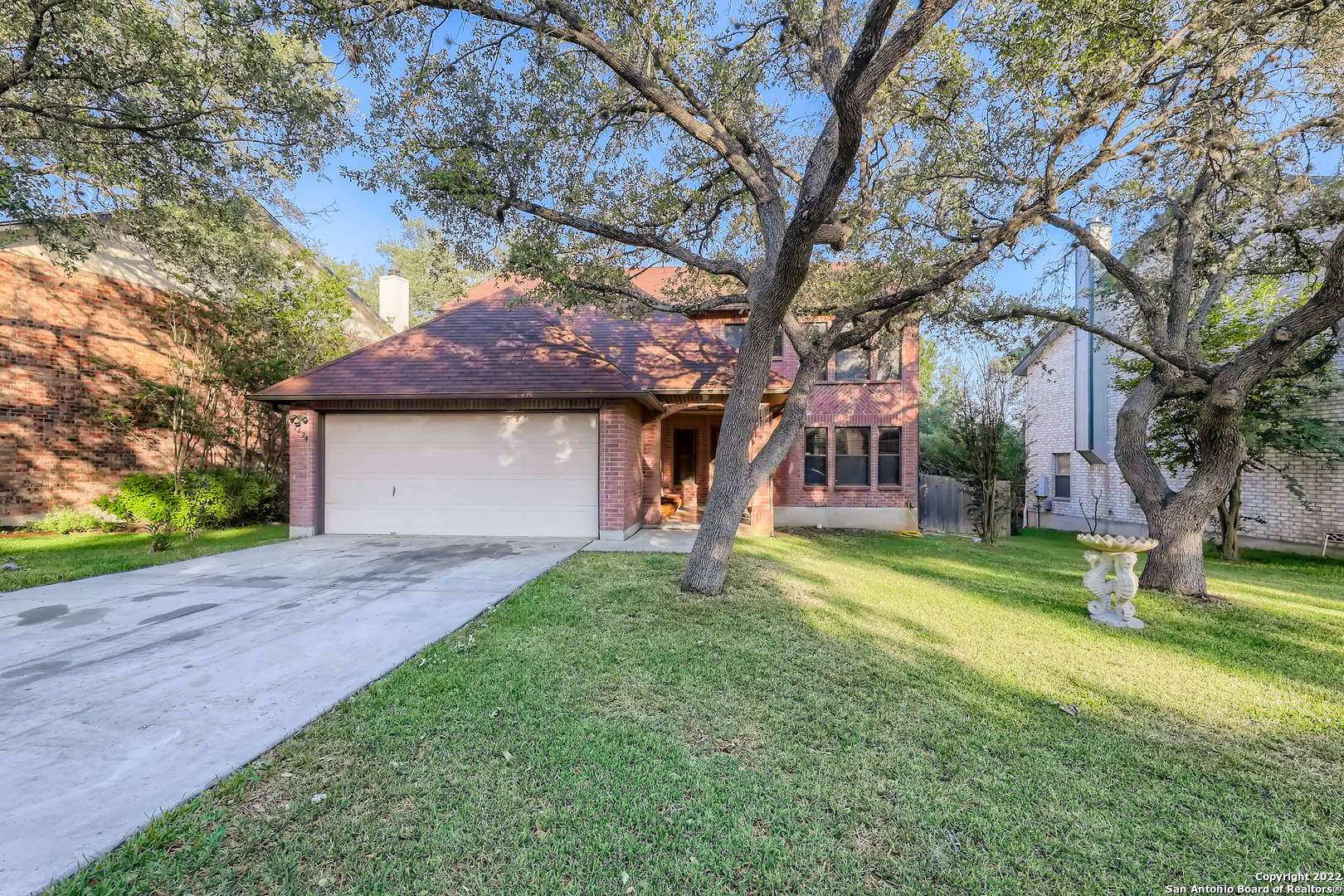*Click the Virtual Tour link to view the 3D Tour. Welcome to 17434 Emerald Canyon Dr.  Mature trees and an inviting entrance lead to an open floor plan, designed for comfortable living and function. Enjoy the spaciousness provided by a separate dining room and bonus room, easily used for whatever fits your needs. The kitchen is fully upgraded, with granite counters, stainless steel appliances, and a large island. All bedrooms are located upstairs. The generous primary bedroom features a  walk-in closet and an ensuite, equipped with a soaking tub and double vanity. A large deck and fenced in backyard are perfect for outdoor dining and entertainment. This lovingly maintained residence is just minutes away from 1604, 281, Mud Creek Park, shopping, and dining.