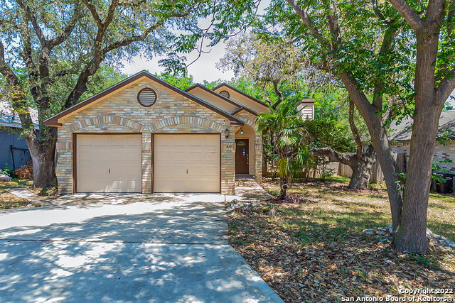This San Antonio one-story home offers a two-car garage. This home has been virtually staged to illustrate its potential.