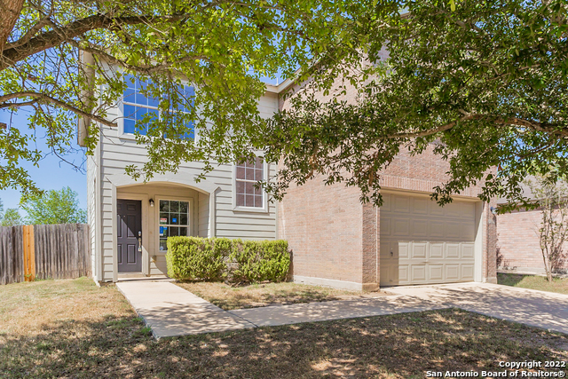 This San Antonio two-story home offers a one-car garage.    This home has been virtually staged to illustrate its potential.