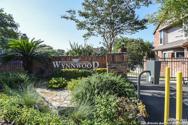 Private and quite townhome style in the Wynnwood Condominiums, a small gated community surrounded by mature trees in the heart of the medical center. A few touch ups to add your personal taste and you are all set. 2 bedr and 1.5 baths, large private patio perfect for small pet or just to enjoy your morning coffee. Refrigerator, washer and dryer are included. Master bedroom has a walk in closet and a vanity that connect to the bathroom. Half bath is downstair. Two swimming pools and a Club house that you can rent for your events. One covered parking space assigned to this unit and plenty of visitor parking.  HOA takes care of the landscape. Easy access to shopping centers, restaurants, HEB, public transportation, USAA, UTSA, IH-10 and 1604 and 410. Don't miss the opportunity and schedule a showing today !!!!!