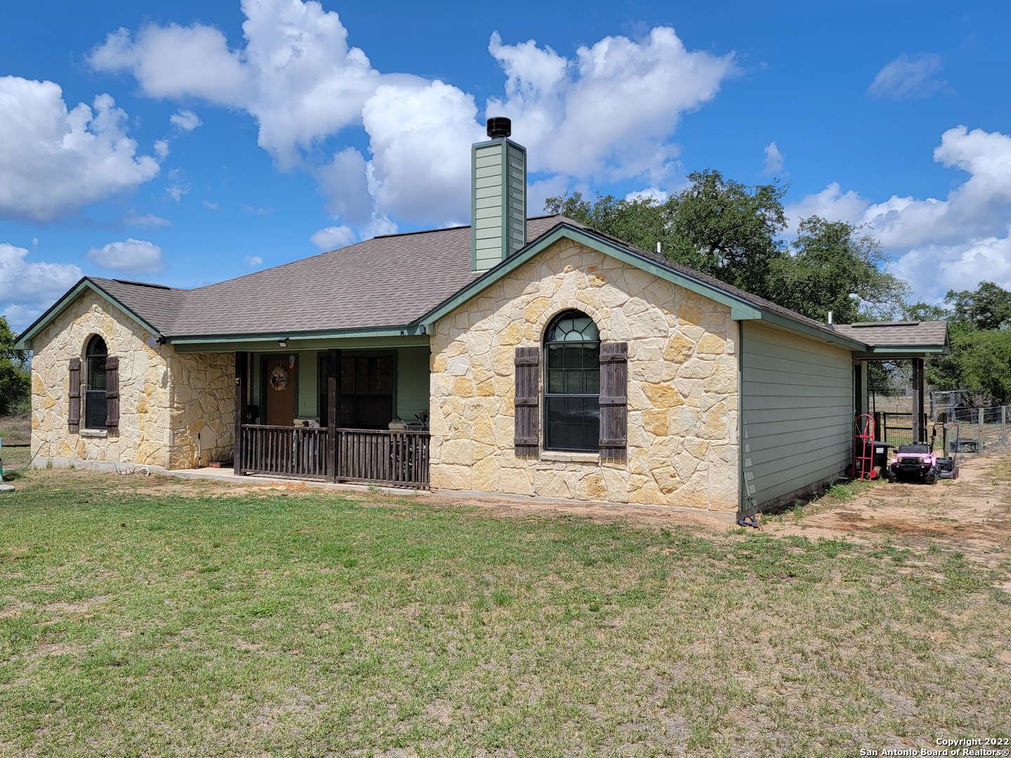 Come to Poteet!  This precious country home has lots of room to help grow your family!  4.46 acres, with mature trees.  Gate opens the entrance as you drive into your new home place!  Call for details on this secluded, ready to move-in 3 bedroom 2 bath custom home on 4.46 acres.