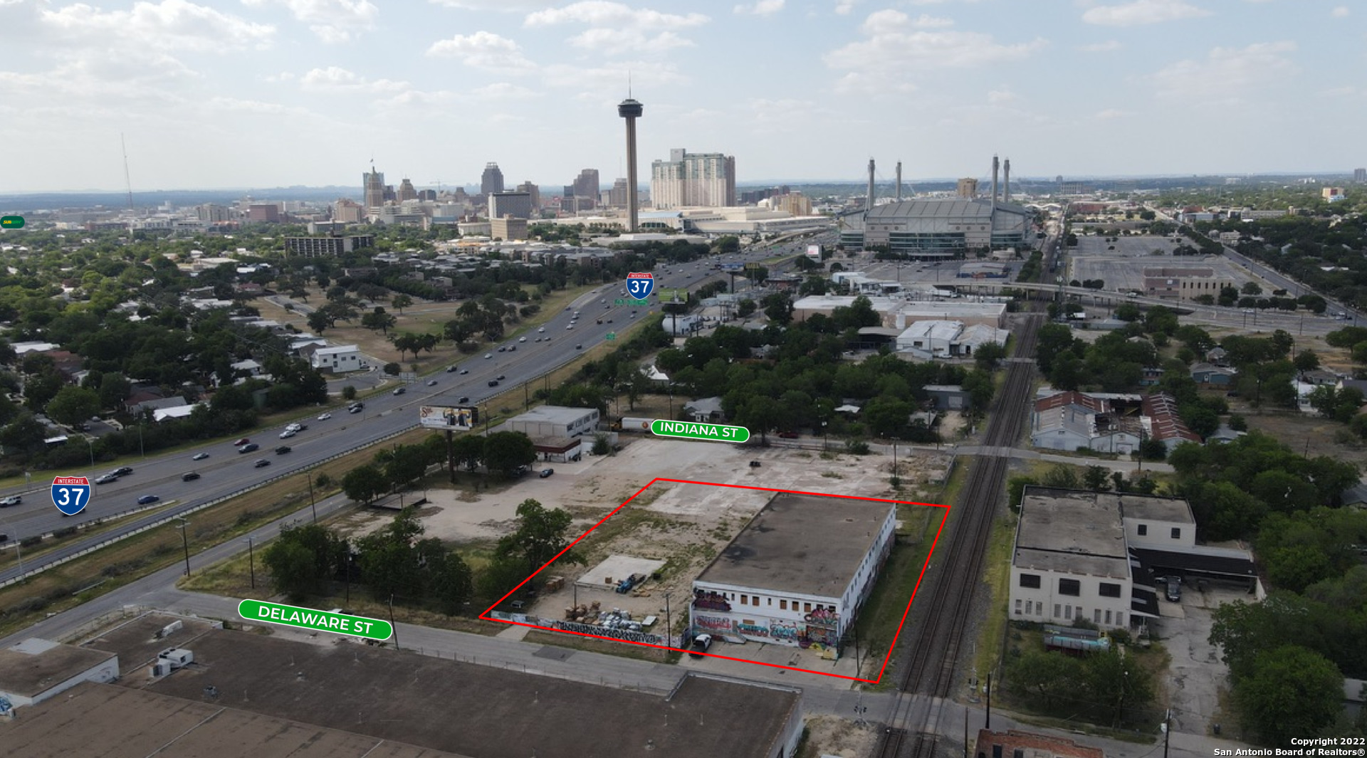 Unique opportunity to purchase or lease a 27,000 +/- SF Industrial/Commercial building lot in Downtown  San Antonio, TX. Unbelievable opportunity for any Industrial Warehouse, Flex Space or Retail This property sits on .94 +/- acres, is in shell condition, has 205 +/- linear feet of frontage and is zoned  IDZ-3. Adjacent to 2.9  acres additionally for sale.