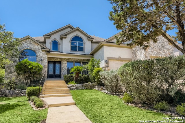 You're going to love this spacious, exceptionally-maintained four bedroom, three full and two half bath home in guard-gated Canyon Springs! Built by the renowned McNair Custom Homes, this home features a beautifully landscaped front yard leading up to the double door entry that takes you inside to an impressive two-story foyer that opens to a sunlit study on one side and a large, bright dining room on the other.  Straight ahead you'll find the open concept design family room with incredible cathedral ceilings, and kitchen, walk-in pantry and breakfast area. The kitchen features all of the high-end finishes you've come to expect from McNair Custom Homes : stainless steel appliances, built-in oven, gas cooktop in the center island, granite counters, and custom cabinets. The vast main floor master bedroom is spacious and has two walk-in closets, a custom ceiling, large windows, and outside direct access to the backyard, and a master bath that has everything you need all in one place. Upstairs a huge gameroom with wetbar, and three oversized bedrooms and two full bathrooms, attic storage space and more. Covered patio overlooks the private, well-landscaped backyard. House on quiet, private street.