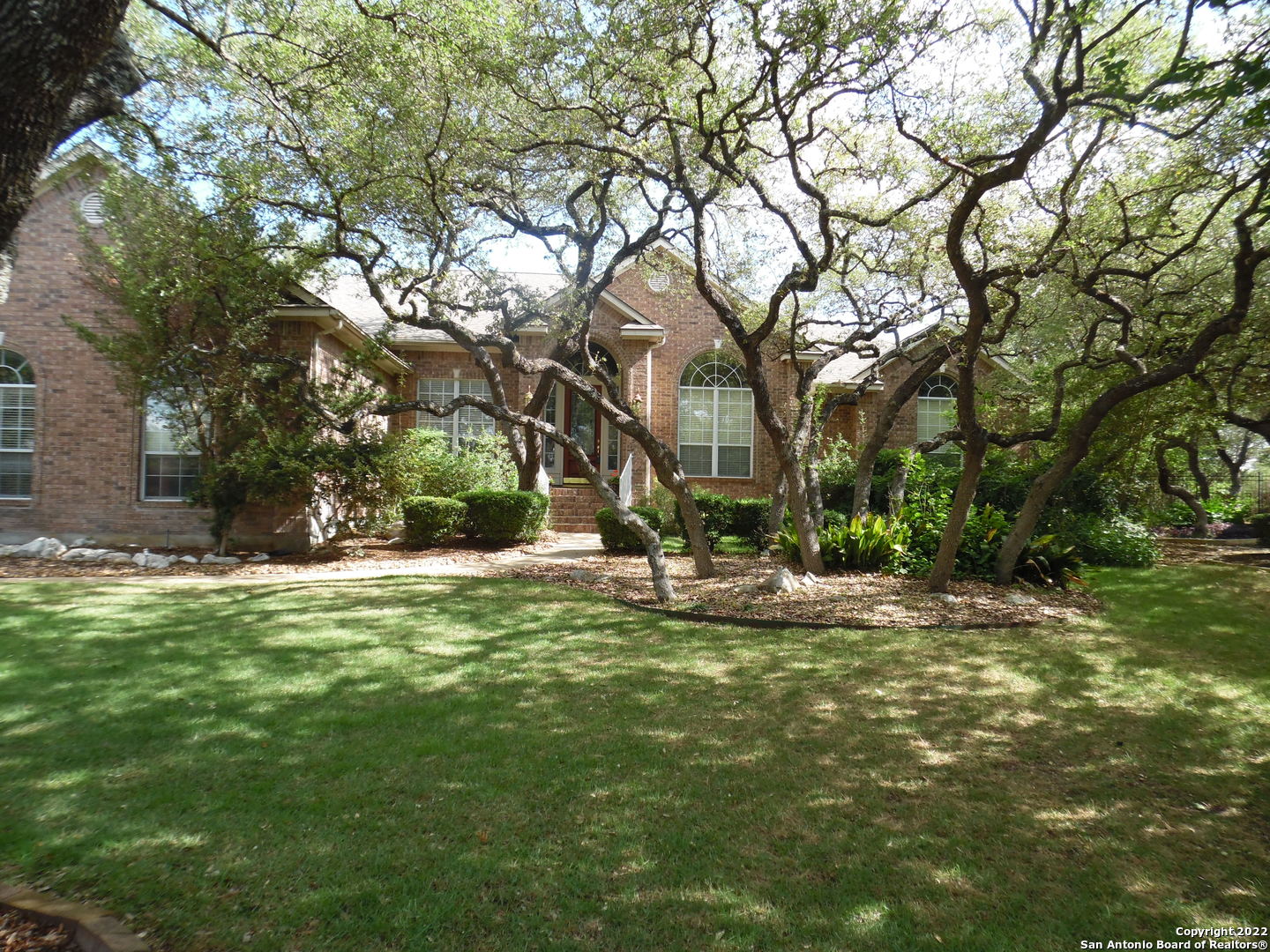 Home is in sought after Legend Oaks neighborhood!!! Fabulous new kitchen!! Beautiful new granite, sink, faucet and glass cooktop. Plus, looking for land-1 acre, 3 car garage, pool & hot tub, lots of storage and NEISD, YOU found it!!!Great backyard for entertaining, with a pergola and covered patio. 2nd bathroom has easy access to backyard without having to go into the house.  Awesome 1 story home!! Located close to schools, shopping, dining and major highways-281 & 1604. Please excuse any boxes, in the process of packing.