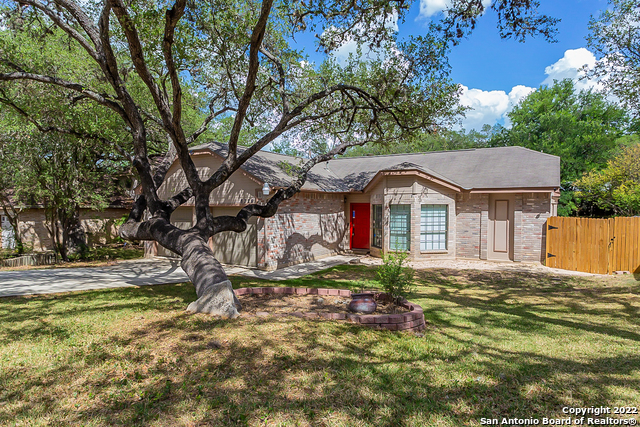 This San Antonio one-story home offers granite countertops, and a two-car garage. This home has been virtually staged to illustrate its potential.