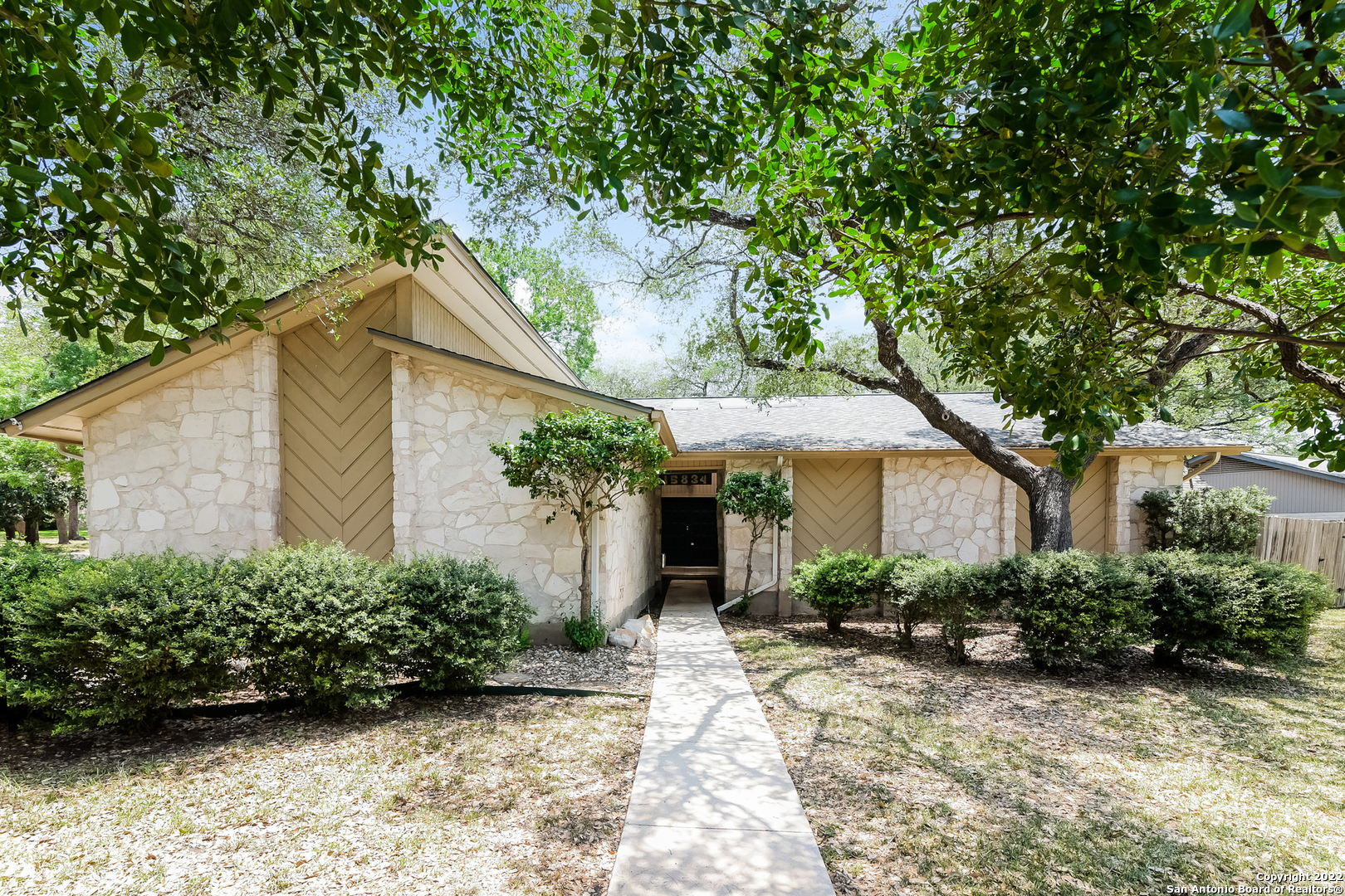 This San Antonio one-story home offers a patio, granite countertops, and a two-car garage. This home has been virtually staged to illustrate its potential.