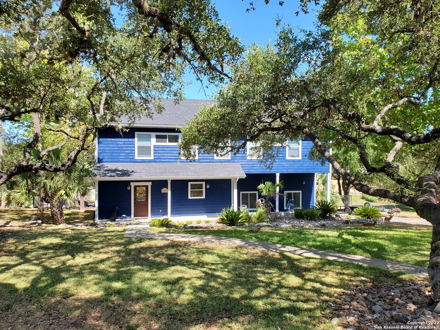 Fully remodeled water front home built 2005,aprox. 2568 sqft*2 beautiful oak treed lots approx .84 acre*kitchen-42" custom wood cabinets, quartz countertops, tile backsplash, 8ft island,stainless steel, builtin double ovens, microwave, dishwasher, refrigerator+black smooth cooktop*2 huge arched windows w/view of lake*2a/c units, utility room w/sink,washer, dryer& freezer *double pane windows*23'x29'garage+height works for boat w/tower*covered dock*2 decks*huge covered patio by lake*swim,boat,fish,ski+great sunsets