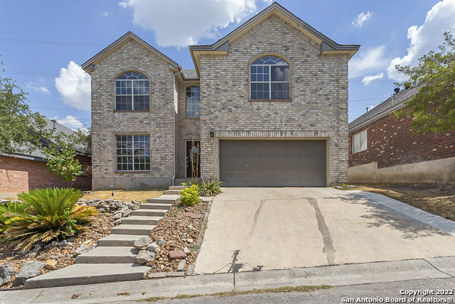 This San Antonio two-story home offers granite countertops, and a two-car garage. This home has been virtually staged to illustrate its potential.