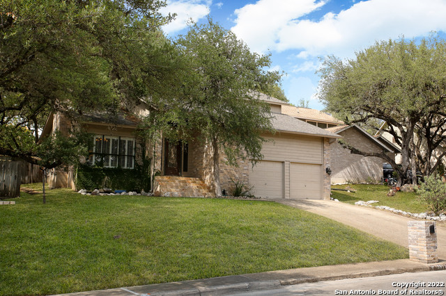 ****Open House July 2 from 11:00-2:00 PM*** Get the moving truck ready! Spacious 2-Story beauty located in prime location with direct access to Salado Creek Trails and seconds you are at Hardberger Park. The unique interior architecture of this home is stunning! The light & bright kitchen, the heart of every home, is completely updated with stainless appliances to include a double oven, a baker's dream! A separate dining area with clear pane glass french doors  overlooking the oversized backyard. Step out to enjoy very own tiered patio setting and large Texas size trees.  In & Out backyard traffic is not a problem with updated wood flooring through-out. The master suite is located downstairs with built in shelving. Travel upstairs to find 3 additional bedrooms that share a full bath.