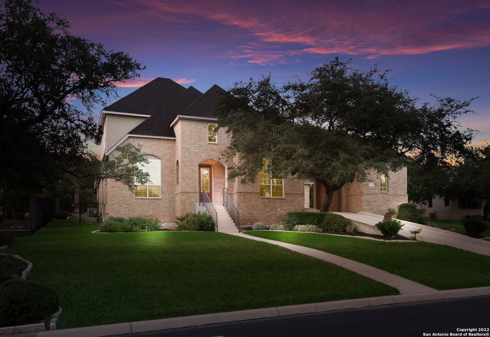 BRIGHT & BEAUTIFUL family home located in the prestigious 24/7 gated/guarded Summerglen community! 4/4.5 with 3,897 sf of spacious living nestled on a private, interior 1/2 acre lot. Stunning curb appeal with porte-cochere design - 3 car garage. Top Rated NEISD Schools. Relax & enjoy an entertainer's backyard dream, stunning Keith Zars Ozone pool, wrought iron fence, expansive covered patio & outdoor kitchen! A chef's kitchen with a large island, granite counters and stainless steel appliances is the heart of this home. The kitchen opens to a spacious family room w/gas fireplace. A separate dining room, living room, breakfast area, private office (potential 5th bedroom) with full en-suite bath, master bedroom/bathroom, SOARING ceilings, an abundance of natural light, gorgeous window views, architectural details, hardwood and tile floors as well as newly installed carpet are all on the first floor. Upstairs find newly installed Pella windows and carpet throughout, a game room, and three large secondary bedrooms.  This is a wonderful home in a great location with easy access in and out of the neighborhood. Pride of ownership can be felt and seen!