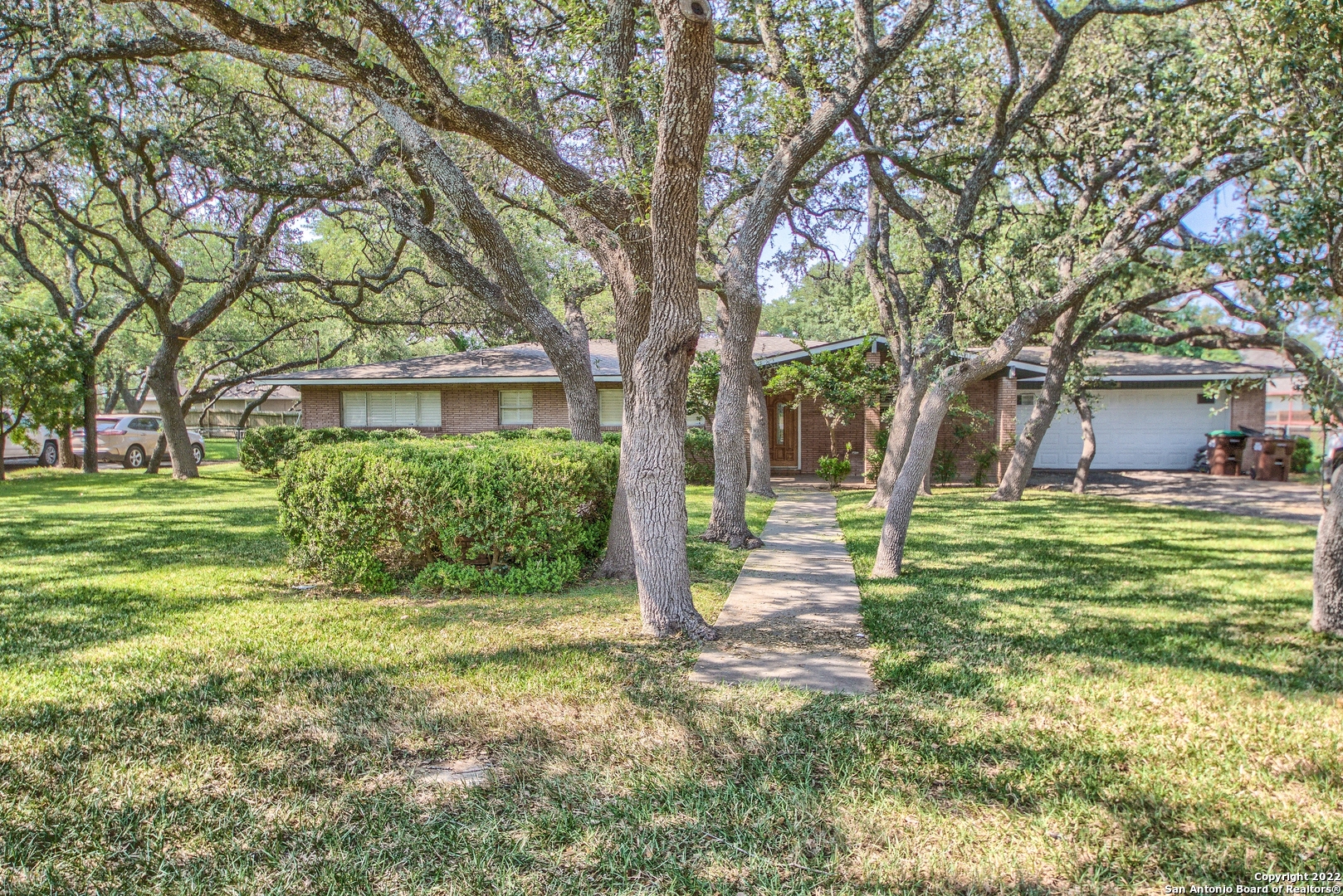 ENJOY YOUR SUCCESS in this elegant 3 bedroom, 2 bath one story. 1907 square feet is nestled beneath sprawling oaks in the popular HOLLYWOOD PARK. New carpet and paint, wonderfully wide porch and lots of built-ins.  Extra large garage and almost 1/2 acre (.44)! You're going to love it.  Move up now!