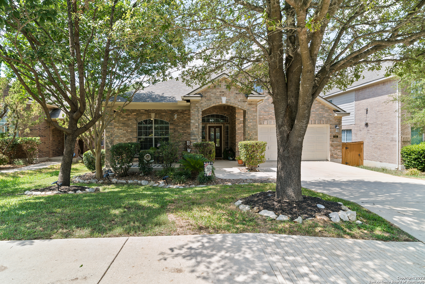 This home sits at the foot steps of the hill country in a highly desirable subdivision that is known for its beauty, friendly neighbors and a close community. The proud owners of this home have spared no expense in keeping this home updated and upgraded with some beautiful, timeless and custom touches. In 2019 the roof was fully replaced by Holden roofing, new front and back gutters were installed, and a bilevel composite deck and cedar pergola built, updated stainless steel five burner GE gas cooktop and microwave and installed laundry room cabinets with granite countertops.  Kitchen cabinets were installed by Kent Moore cabinets in 42 inch Alder wood cabinets w/ turn wood detailing, silestone countertops installed, crown moldings in the entry, foyer, master bed and bath, dining room and bedroom. LED lightbulbs throughout the house including automatic porch lights. In 2021 the downstairs guest bathroom was remodeled with all new fixtures, including replacing the tile, tub, toilet, faucets, countertops and fresh paint. New cabinets replaced & granite countertops installed, complete remodel of shower with a spa/rain feature and granite seat, frameless glass surround, installed a new freestanding tub, and light fixtures. TV mounts available in the game room, master bedroom, and guest bedroom. Wide- slat plantation shutters installed in masterbedroom and bath. Custom closet in master bath with drawers, shelving and tile floor. The HVAC interior and exterior system was replaced. Custom shelving installed in closet below the stairs for organization of toys, books, or crafts. Updated ceiling fans, new light fixtures with LED bulbs in entry, foyer, dining room and breakfast room. Home is plumbed for a water softener and drinking water purifier. In 2022 a new garbage disposal installed and new stainless steel GE dishwasher and new sod laid out back.  Huge game room/media room sits alone in the upstairs w/ a half bath.  This is the only room w/ carpet. 4th bedroom used as an office but can be used as a bedroom if you change out the glass doors.   The home is move in ready.  Home backs up to a greenbelt with lots of mature trees.  Stonewall Ranch has easy access to IH10 with plenty of shopping and restaurants all around.  Easy, fast access to HEB, Walmart, La Cantera, Fiesta Texas, The Rim, Paladium Imax Theater, Lifetime Fitness and many more.  There is a beautiful community pool, clubhouse and playground in walking distance for your family to enjoy.  Great school district with high rated elementary, middle and high schools that feed into this community.  You are minutes away from some amazing hiking at Friedrich Wilderness Park.You will not be disappointed in this home, subdivision or location.  Book your appointment now.