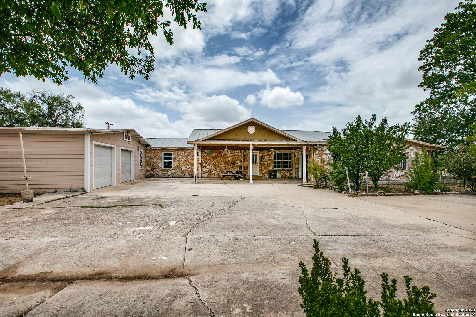 PRIME corner residential home on .71 acres, in a very desirable location in the Southside of San Antonio. This home needs some lots of updates, but plenty of room to make as home/office and plenty of parking! Currently zoned residential, but can be zoned commercial.  Recommend contacting Bexar County zoning division to see if it can be zoned for your business.  Fenced was removed dividing 9756 & 9758 Southton allowing owners to walk to work (restaurant building for sale as well).  Not many corner lots become available with this type of potential for home owners or business owners.  Just minutes away from HWY 410, with easy access to Brooks City Base, 281 N, 37 South, Texas A&M San Antonio, restaurants, retail and much more.