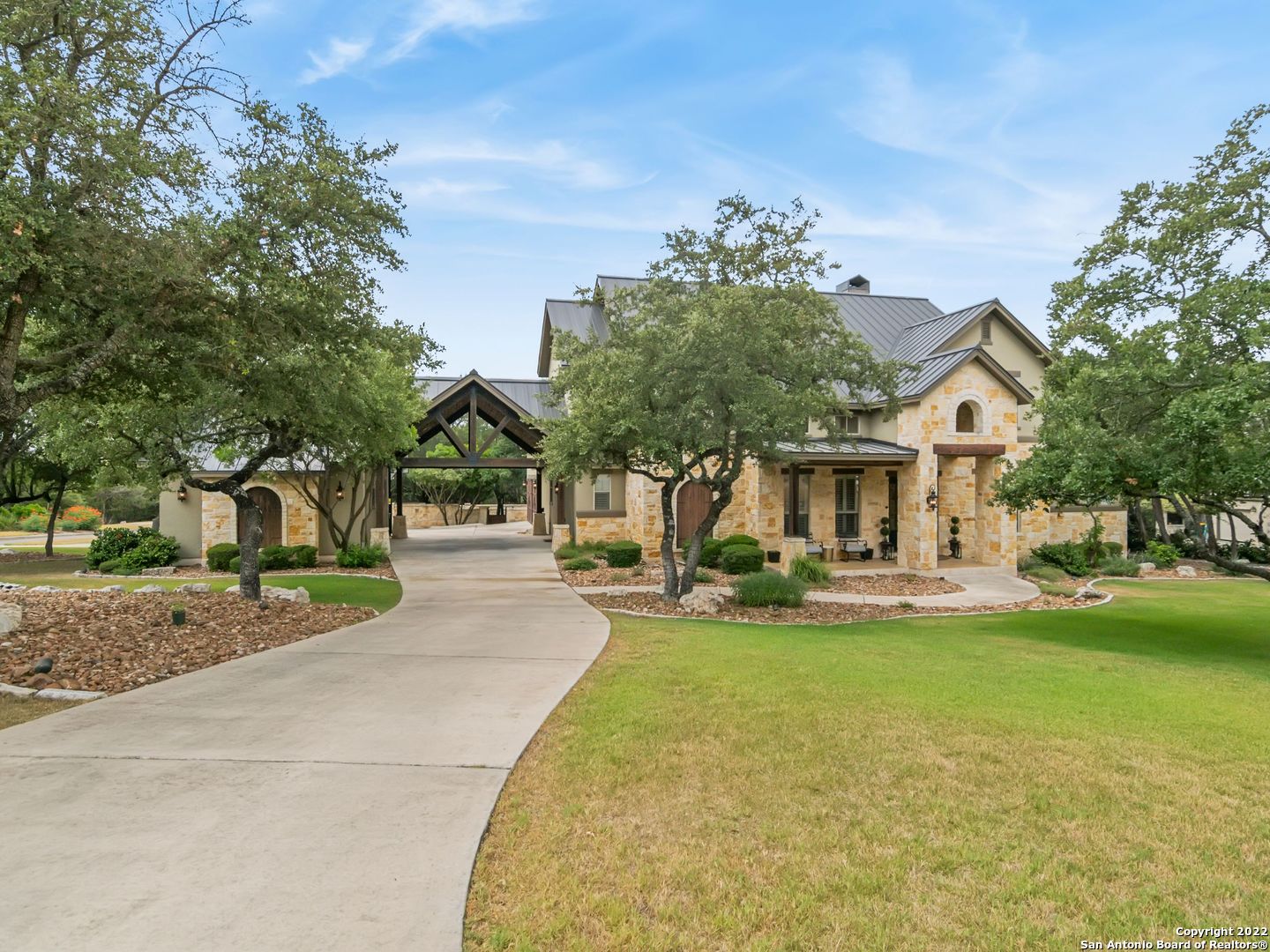 Come check out this gorgeous custom home on a corner lot in Menger Springs! Top of the line updated finishes throughout with a beautiful master suite, office, movie room, large living spaces and a bonus room.   The backyard offers plenty with covered outdoor living space, large pool with hot tub, putting green and dog run. Sits on over an acre with mature landscaping in upscale neighborhood right in Boerne!