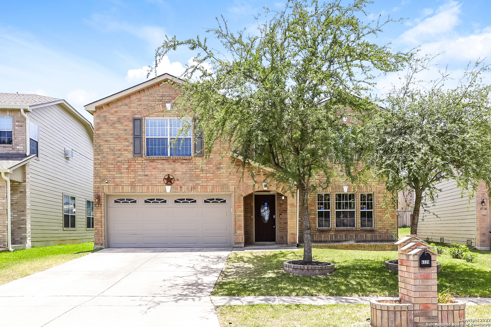 This Live Oak two-story home offers a two-car garage.    This home has been virtually staged to illustrate its potential.