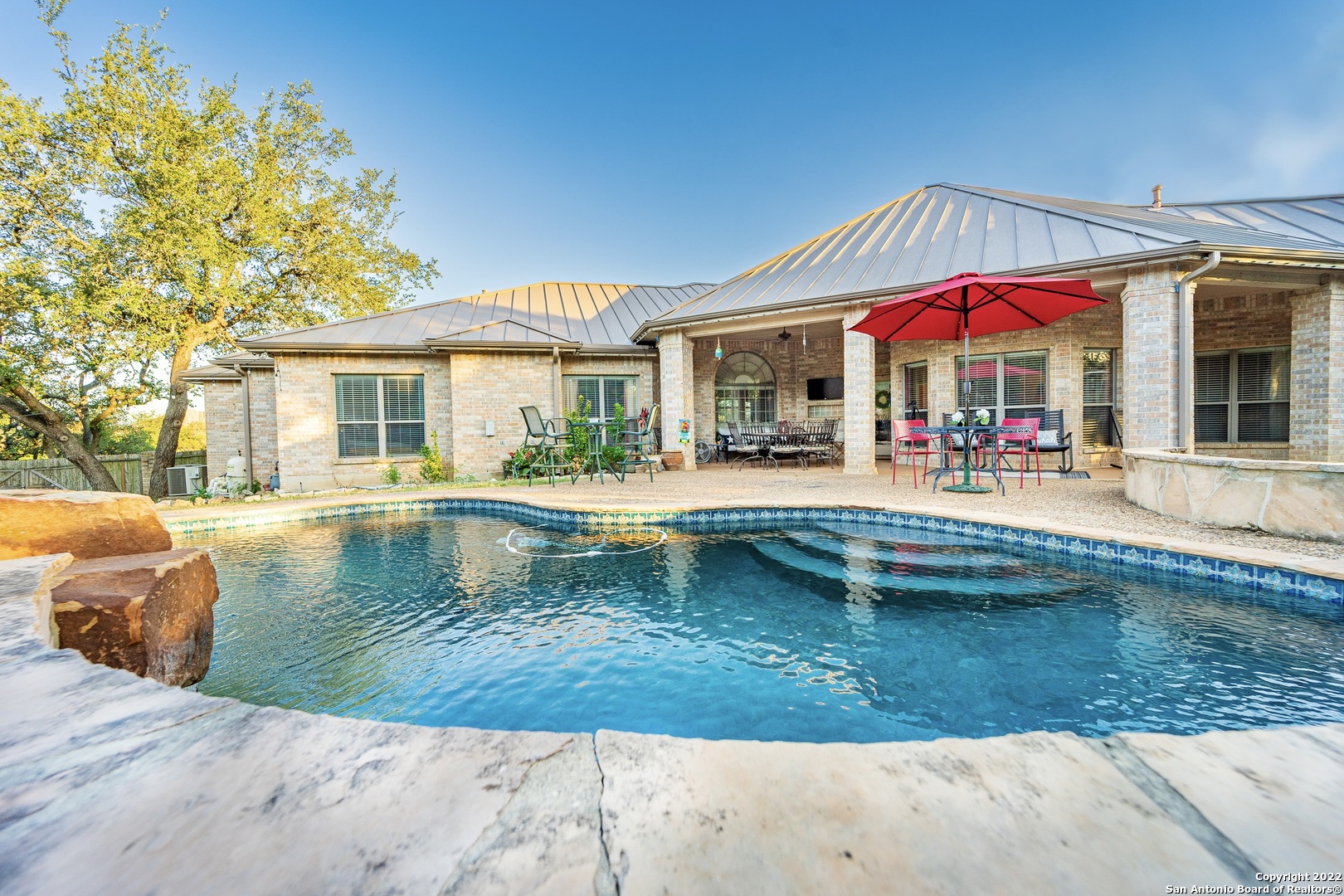 Splish! Splash! OPEN HOUSE SAT 7/9/22 1-3PM **Sprawling Single Story on Over An Acre!**Corner Lot provides privacy for your sparkling IN-GROUND POOL**Stunning Shavano Creek neighborhood is close to I-10, Medical Center, USAA**FIVE BR/3.5 baths PLUS Study/Office and Game Room**UPGRADED Kitchen features WHITE custom Cabinets, SS gas Appliances, Granite Countertops, Vegetable sink/Island**Opens to Huge Family Room w/ gas/rock fireplace**Private Master Suite with Trendy Bath! Grey/white Tile, Countertops, stand alone tub, Glass Shower, Custom Closet, WOW! All Secondary BR's share Jack and Jill Baths**Game Room is the only room upstairs**Entertain outside under Covered Patios**Enjoy Refreshing Pool with Rock Water Feature**3 Car Garage, Circular Driveway for guests**See it today!