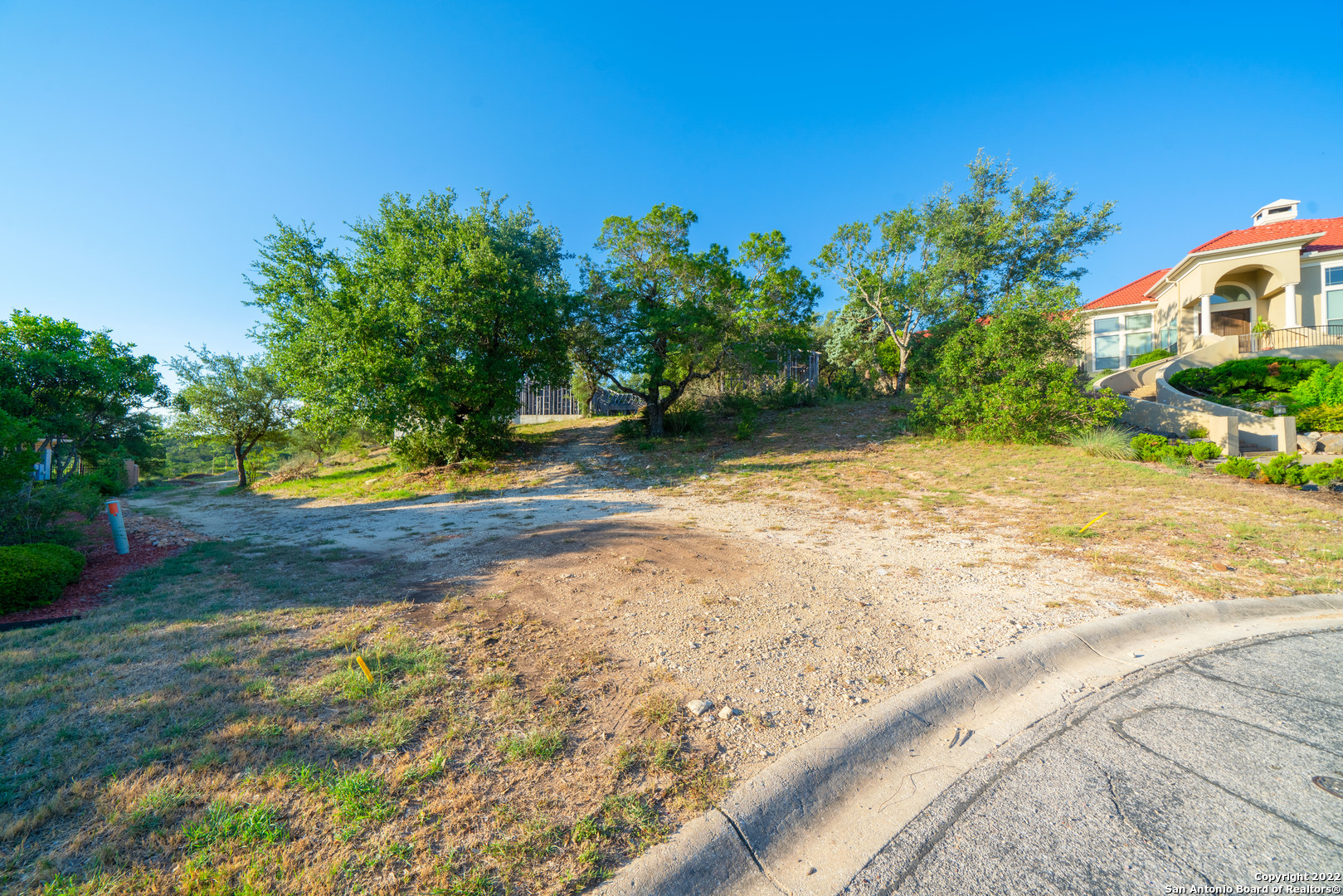 Build your dream home in this one of a kind lot on a cul-de-sac in the heart of The Dominion neighborhood. This lot is over 1 acre and features a gorgeous and tranquil view of the Hill Country. There is an existing slab and frame.  Design the home of your dreams in the perfect location with easy access to the highway and just minutes away from La Cantera and The Rim. Make this your lot today!