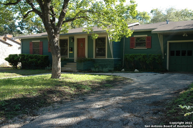 Large mid century located in desirable Alamo Height.  Great bones, move in condition but could use a modern upgrade. 4 bedrooms 2 1/2 baths 1 car garage.  Large privacy fenced yard.  Covered deck, chicken house.