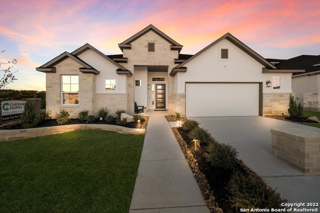 Stunning 3 car garage 1 story stucco/stone home. 3 bedroom 2.5 bath with game room and study/formal dining.  Master bath features free standing tub and mudset shower.  The chef's kitchen boasts quartz countertops, tile plank floors and high design midnight navy painted cabinets.