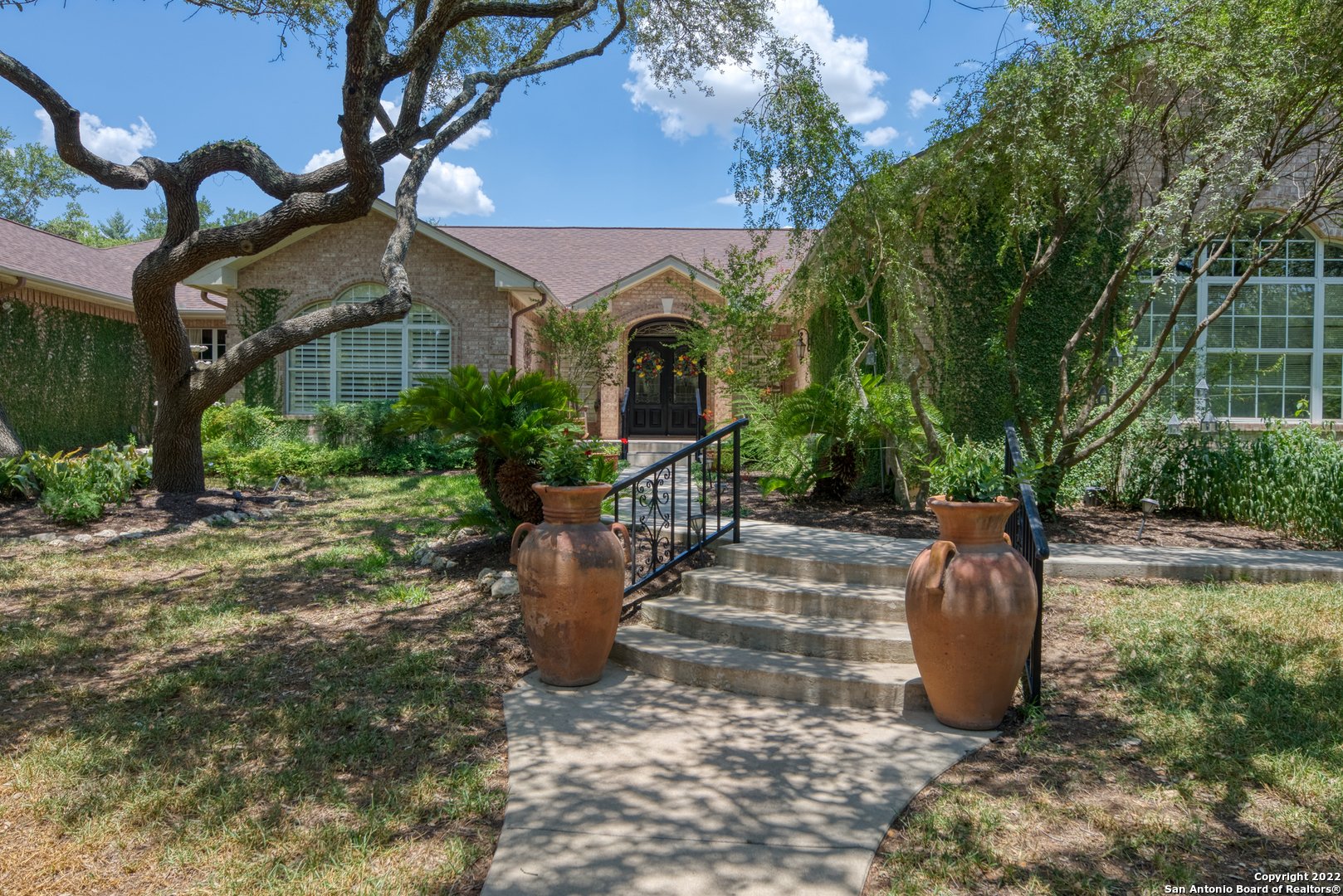 Fabulous one-story home on one acre in town! Highly sought-after neighborhood, close to HEB, easy access to IH-35. This lovely 4-bedrooms, 3 bathrooms with 3 car garage home is great for entertaining. Come see this backyard with gorgeous pool/hot tub and plenty of covered space to relax and enjoy life! All the bedrooms are good sized with huge closets, master bedroom has 2 walk-in closets, spa like bathroom, 2 large living areas, plus 2 big dining areas, gourmet kitchen, office/utility area by garage. If you like to entertain this is a must for you!