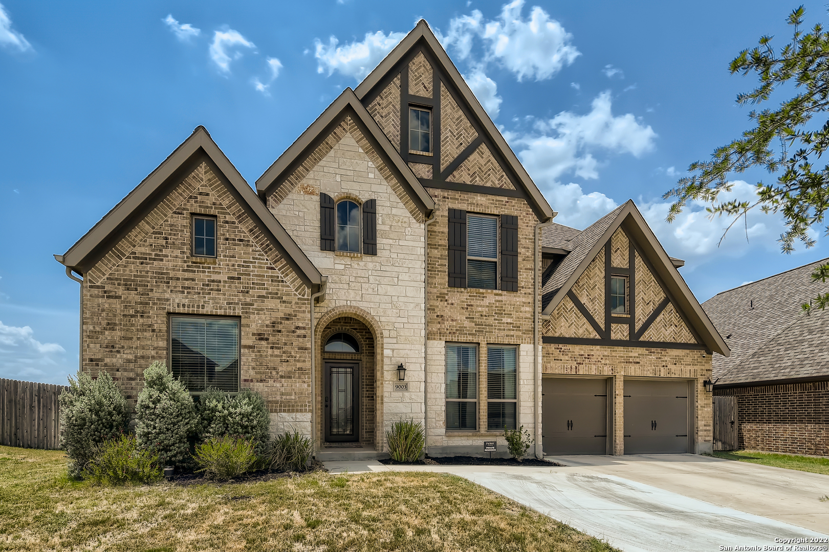 OPEN HOUSE SATURDAY SEPTEMBER 24TH FROM 12-3  *******WHY WAIT FOR THE BUILDER? BELOW NEW BUILD BASE PRICE WITH TONS OF UPGRADES! LOCK IN YOUR INTEREST RATE NOW! This unique Perry Home floor plan, is a rarity in the Kallison Ranch subdivision. Home is located across from the communities' amenities (pool and park). Massive backyard with stone back fence, has a 10x10 slab, ready for a shed; and is perfect for a pool, with plenty of room to spare. Covered back patio with outdoor ceiling fan and gas hookup, ready for an outdoor kitchen.  Downstairs: Mother-In-Law suite with full bath, Study with French doors, and Master Bedroom. Master bath has his and her walk-in closets and vanities, separated by a large jettison tub. Standing shower is equipped with his and her shower heads and built-in benches. Kitchen features beautiful quartz countertops, large breakfast bar, touchless faucet, Reverse Osmosis water spout, two ovens, and 5 gas burner cooktop. Extra-large, walk-in pantry. Laundry room has a walk-in storage closet, utility sink, and is large enough to fit a medium sized chest freezer and medium sized standup freezer/refrigerator.    Upstairs: 3 bedrooms, one is an ensuite. All have walk-in closets and ceiling fans. Loft/game area is open to the first floor. Media/theater room with French doors.  Other Features: Smart Home (thermostat, lights, doorbell, security). Extended driveway (parking pad). 3 car garage. Two tankless water heaters. Jason's Water Softener and Filtration (Lifetime Warranty). Motorized blinds in the great room's clerestory windows. Cast Iron spindles on staircase and railings. Front and Backyard Irrigation System. Panel box in downstairs storage/coat closet. All rooms wired with Cat 5 hookups.
