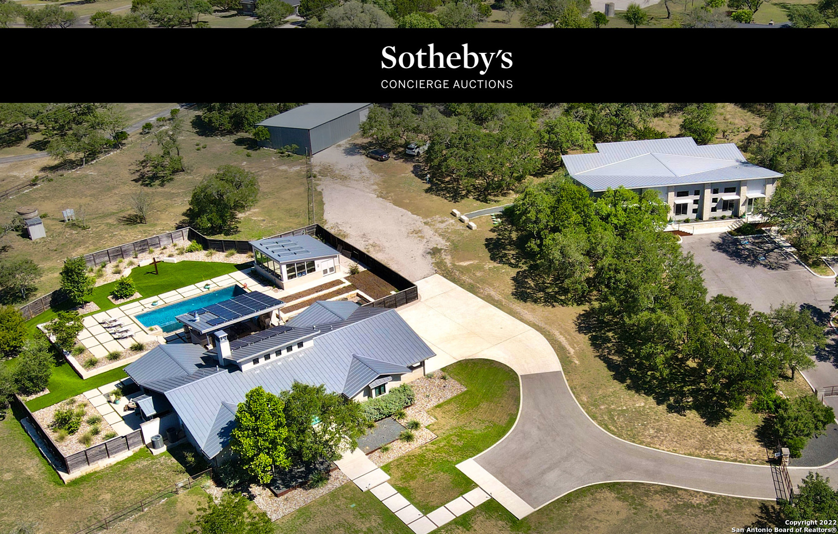 AUCTION BIDDING OPEN: Bidding ends August 31st. Previously Listed $4.5M. Current High Bid $1.525M. No Reserve. Showings Daily By Appt.     Located mere minutes from downtown Boerne's famous Hill Country Mile, 106 Sisterdale Road is a truly unique opportunity. This modern ranch home is custom-fitted with countless master crafted finishes and boasts its own state-of-the-art commercial/showroom on the property itself. Natural stone floors, custom-made lights, artisan plaster walls, and bespoke detailed woodwork throughout speak to the unmatched craftsmanship at every turn. The main house is ideal for entertaining. The bright chef's kitchen with concrete counters and ample room to gather opens to the indoor living space, transitioning in turn to the spectacular outdoor entertaining space. Verdant lawns meet a sprawling patio, surrounding a turquoise pool that invites you to soak the day away. Outdoors, a separate gated entrance and parking area ensure convenient access to all amenities. The showroom, currently operating as a Pilates studio, is fitted with every feature for turnkey takeover: insulated concrete walls, LED lighting, a full water catchment system, custom locker rooms, kitchen with laundry, and private offices await within. Ideal for a studio, gallery, or an at-home office or retail space, the area allows for flexible-use to live and work in modern luxury. With potential for the transformation or addition of a guest house or staff quarters, you can create the ultimate family compound or a world-class equestrian estate as the nearly 4-acre property offers a desirable blend of commercial and residential possibilities.