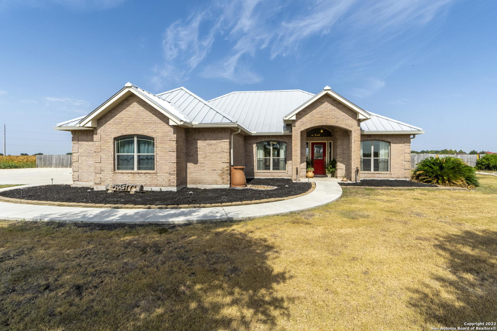 This spacious, beautiful, all-brick one-story home sits on 1.77 acres, just down the road from the highly acclaimed Navarro ISD schools. This home is perfect for inside and outside entertaining! Breakfast bar, built-in desk, formal dining room, open floor-plan with hardwood laminate & stained concrete in main traffic areas. Plenty of storage inside this home. Additional storage in the backyard for equipment or household items in the huge outside storage building with attached RV carport, including a 30-amp electric service. Enjoy cooling off each day in your own private pool or under the covered back patio. No HOA!!!