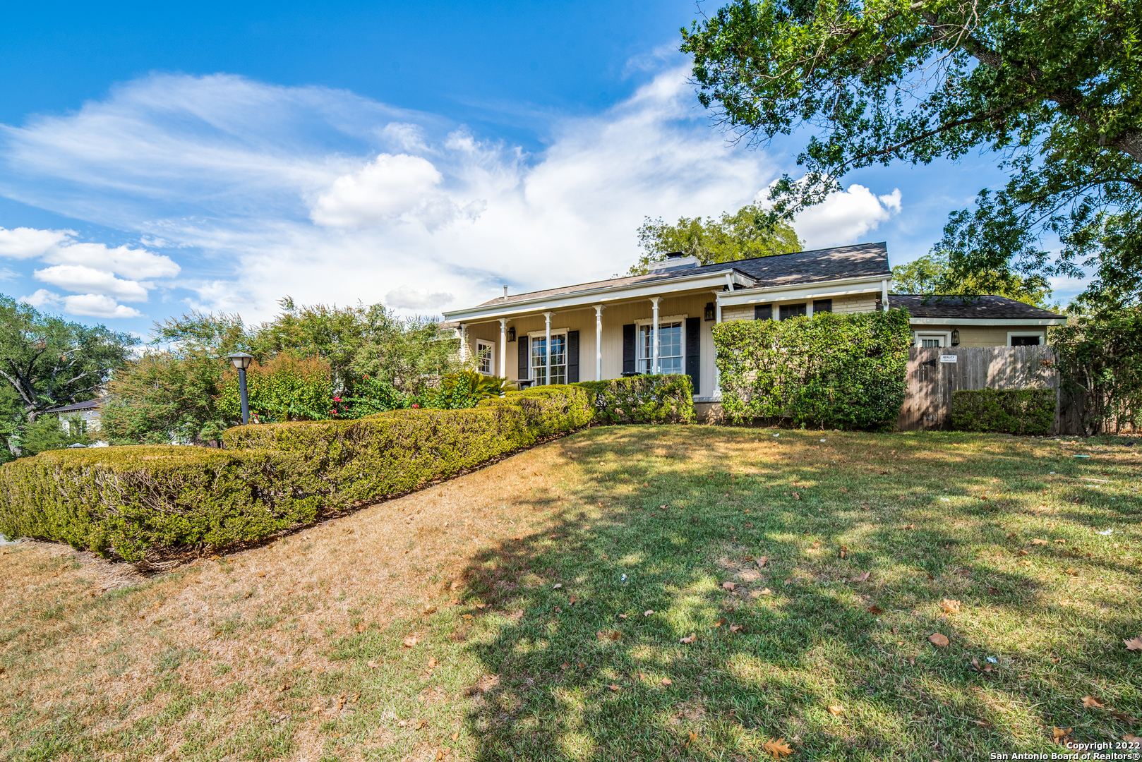This lovely Terrell Hills home is on slightly more than a half acre and positioned on a beautiful sloping lot with a west view. Whether the goal is to build new or remodel, this location is central and convenient to Ft. Sam, downtown, major highways, the airport, Pearl, and The Quarry.