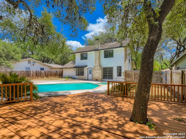 LOCATION | LIFESTYLE | DESIGN | POOL | Tremendous turn-key ownership opportunity in San Antonio's highly desirable North Central area! Experiencing this home begins with the gorgeous curb appeal and ends well beyond that! Upon entry you're welcomed by an open formal dining area or a second living room to your right. It leads you to the gorgeous updated kitchen that features white custom cabinets, black granite countertops, tile backsplash and all new stainless steel appliances that is sure to bring out your inner chef! It doesn't end there, it comes with a breakfast area that includes a warm and cozy nook with the views of the backyard oasis. As you continue through this beautiful home, you have the main living room, a perfect place to gather around the fireplace with family and friends. Don't forget the cute powder room, perfect for your guests. The private quarters are upstairs and include a luxurious master en-suite with custom tile shower, granite double vanity and a stunning tile accent wall. Step outside and imagine the amazing time you will have with friends and loved ones with all the back yard has to offer. Whether you are cooling off in the pool, relaxing in the spa or enjoying a BBQ poolside on the large deck under the majestic trees, you are sure to build fun and lasting memories for years to come. The pool and spa are heated for absolute year-round enjoyment! For modern comfort, convenience and energy efficiency the home has been fitted with independently split HVAC units. Finally offering the ability to independently set custom temperatures throughout the home. Location is impeccable, offering walking distance to McAllister Park and just a short drive to San Antonio International Airport, popular eateries,1604, 281, 410 and about 20 mins to the Quarry, Pearl, La Cantera and the Rim. Home qualifies for special financing that can save you thousands of dollars in closing costs + $1000 lender credit! Text SAHOMES4 to 59559 for more info. Seller is also offering a generous incentive package!