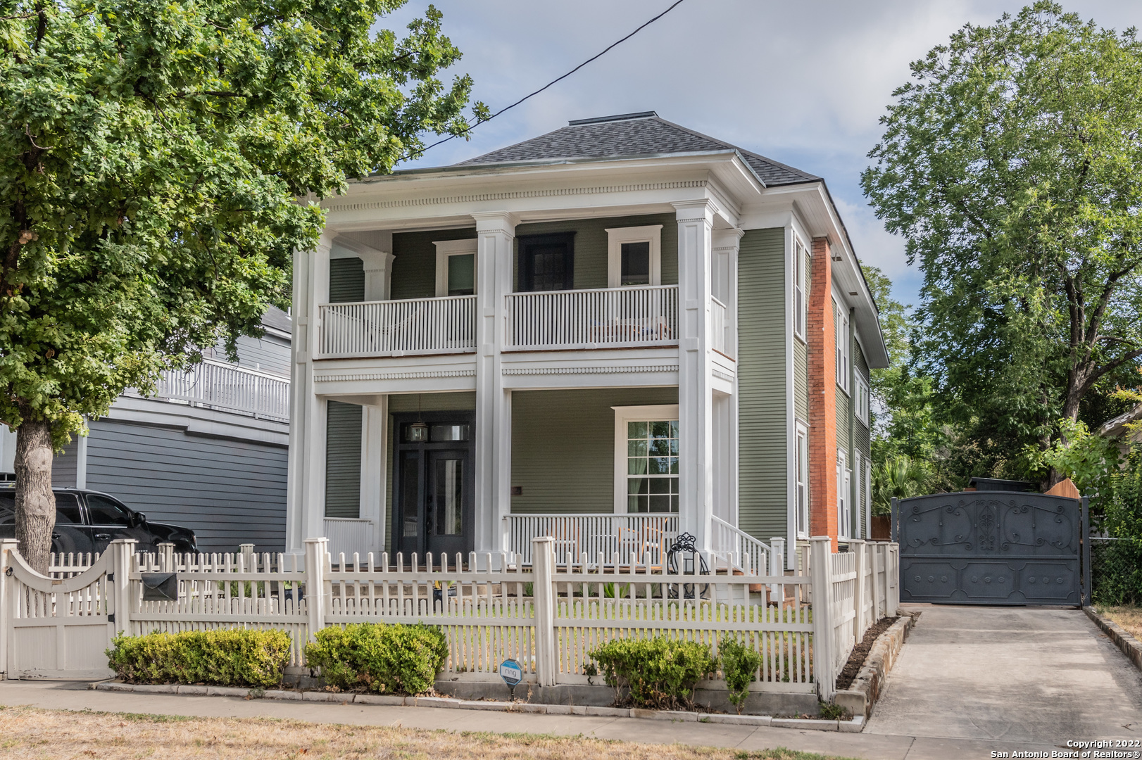Beautifully updated 1914 character home in the Alta Vista neighborhood. Historic charm and modern updates mix seamlessly in this 4 bedroom 2.5 bath home that features 11 foot ceilings, original hardwood floors, 2 prominent fireplaces outfitted with custom-made caps, a meticulously remodeled kitchen (including an auxiliary kitchen/library space and an oversized walk-in pantry), beautiful crown molding and tray ceilings, and an upstairs covered deck with views of downtown. The secluded backyard includes a 36 foot pool with surrounding pavestone patio and professional landscaping with automatic sprinkler system; all surrounded by a new 8 foot privacy fence with an electric iron gate. New roof, exterior paint, and new double-paned windows throughout! Located just 5 minutes from the Pearl. Come see the gem of Alta Vista!
