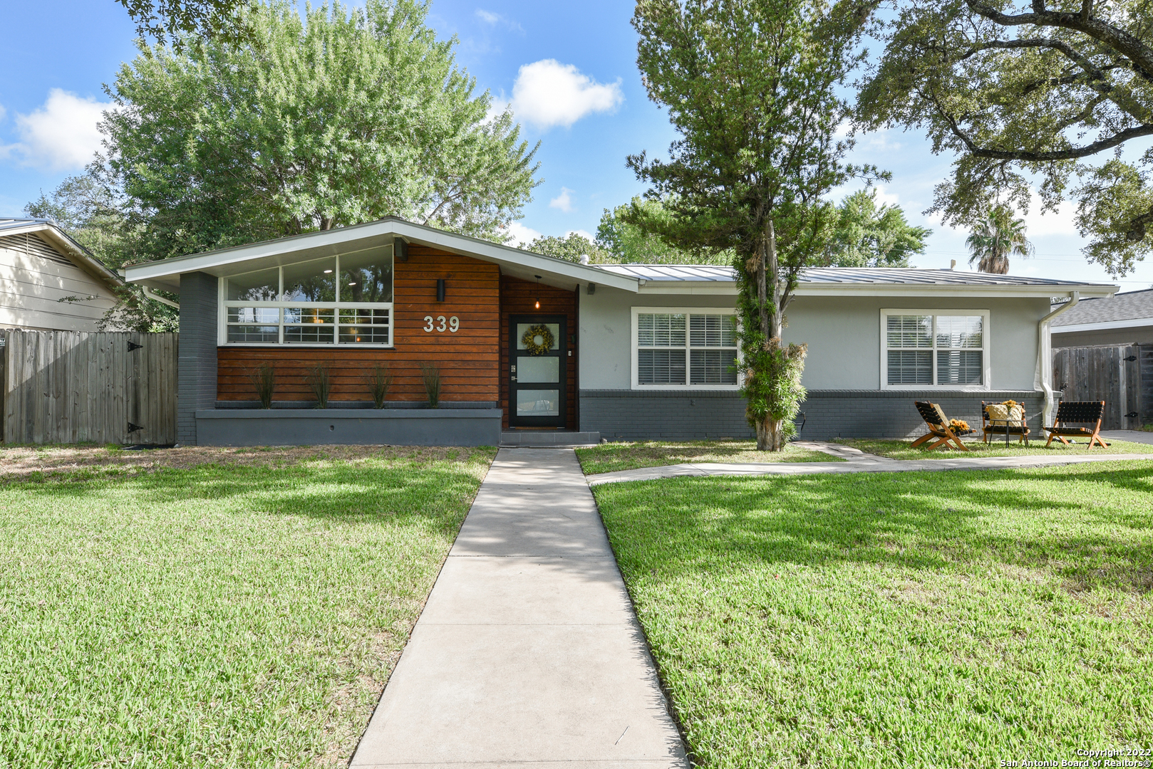 **OPEN HOUSE: Friday, 11/11/22. 4-6PM & Saturday, 11/12/22, 11AM-2PM**  Offering multiple finance options, 2-1 Buydown or VA Assumable loan*, this stunning mid-century modern is located in desirable Alamo Heights ISD and on one of the loveliest streets in Northridge. Updated with emphasis on a classic easy living style. The Master Suite addition, with a full bath and huge walk-in closet, completes this exceptional property consisting of a total of 4 bedrooms and 3 full baths. The spacious kitchen features quartz countertops, gas cooking, and stainless steel appliances. (All appliances convey.) The art-deco marble tiled fireplace showcases the spacious and inviting living room.  Beautiful inside and out with many upgrades and improvements, including tankless water heaters & 18 Seer HVAC units, and, more...  The location cannot be beaten:  schools within walking distance, upscale shopping, and entertainment within blocks. Note: All major appliances convey.  *Certain terms apply.
