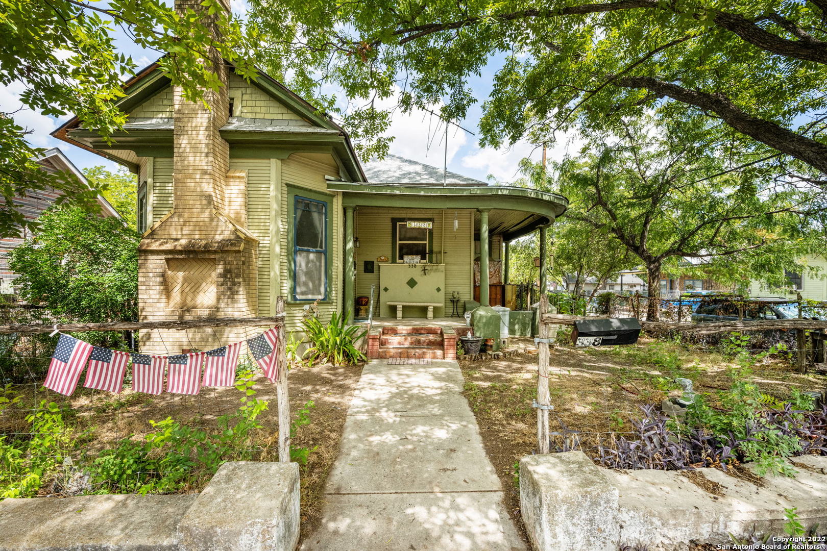 Investor Special! Situated in the historic Beanville Subdivison, bordering Englewood and Southtown this corner lot is plumbed and has electrical for a triplex in the main structure, with an additional 2 bedroom 1 bath structure in the back yard.
