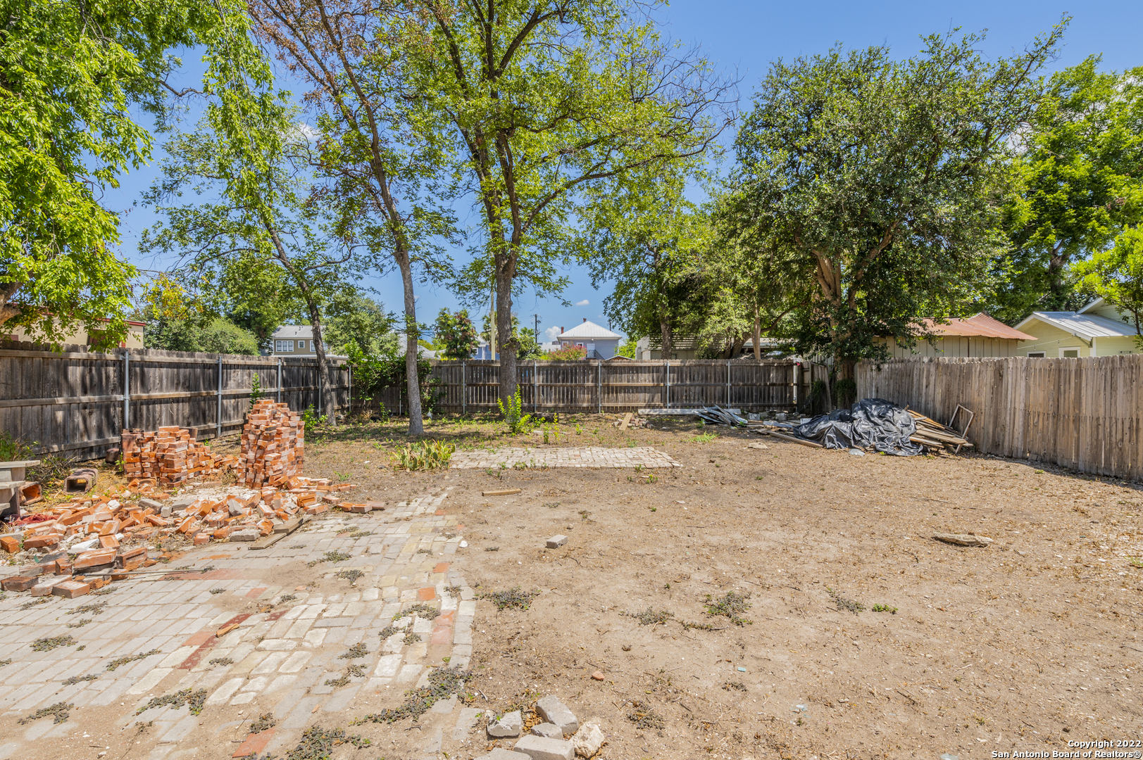 6000 sq.ft. lot, designated RM4 Historic Landmark. You can build a DUPLEX in the back with up to approx. 4000 additional sq.ft. living space for a whopping 5000 sq.ft. total !! 1 minute bike ride to River Walk in King William. Across the street from Beautify San Antonio Park. 2 blocks from HEB.