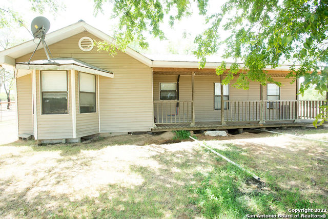 Beautiful property located just outside of Somerset, TX.  Enjoy all the comforts of country living in this 3 bedroom 2 bath on a well-maintained 31.75 acres conveniently located just minutes away from 1604. Twenty minutes from San Antonio and other amenities. Ag exempt property is fully fenced with remote control entrance gate, cleared acreage ready for you to move in and enjoy all it has to offer. Property features a seasonal pond, mature trees, work shop and cattle panels.